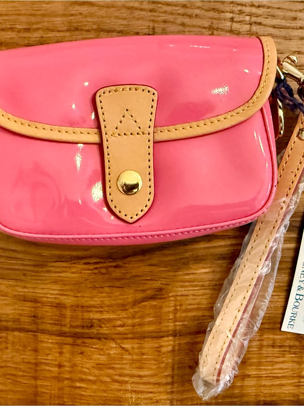 Dooney & Bourke Pink Patent Wristlet with Tan Trim
